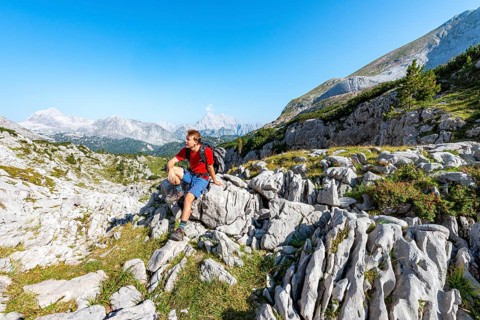 Hiker sitting on a stone