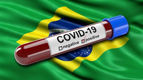 Flag of Brazil waving in the wind with a positive Covid-19 blood test tube. 3D illustration