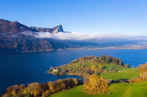 View from Pichl Auhof to the Mondsee lake and dragon wall