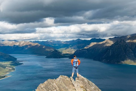 Hiker stands on a rock