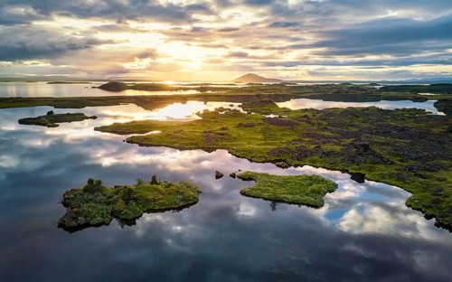 Aerial view of small green islands in the lake