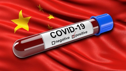 Flag of China waving in the wind with a positive Covid-19 blood test tube. 3D illustration