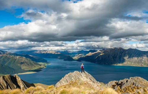 Hiker stands on a rock
