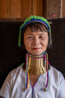 Long necked woman with several brass rings around her neck