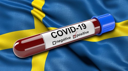 Flag of Sweden waving in the wind with a positive Covid-19 blood test tube. 3D illustration
