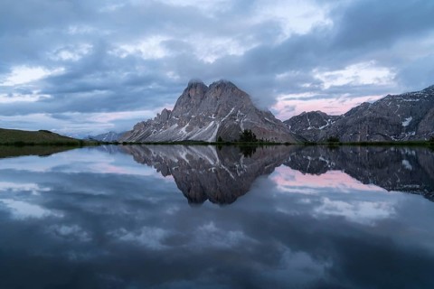Peitlerkofel with reflection in small lake