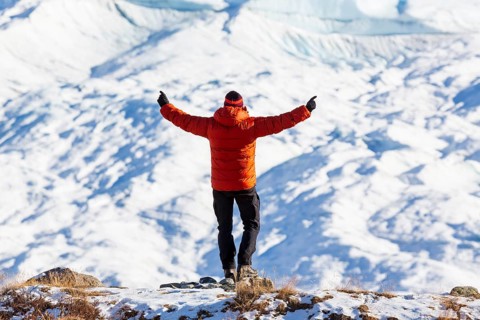Man looking at inland ice near Kangerlussuaq