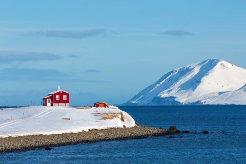 Lonely red house on the Akureyrifjord