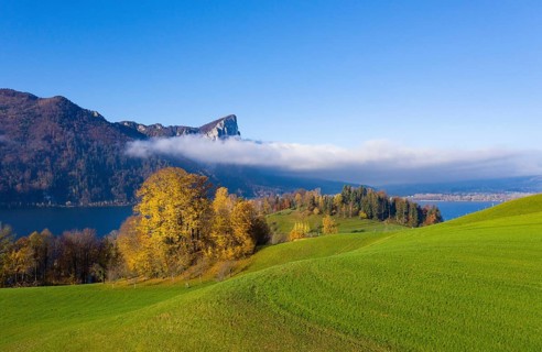 View from Pichl Auhof to the Mondsee lake and dragon wall