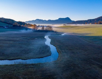 Outflow of the Zellerache from the Irrsee lake with view into the Mondseeland