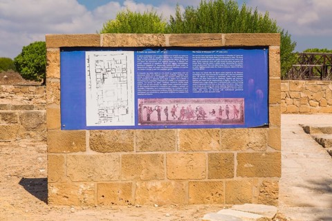 The House of Dionysus information panel and ancient ruins at Tombs of the Kings archaeological site