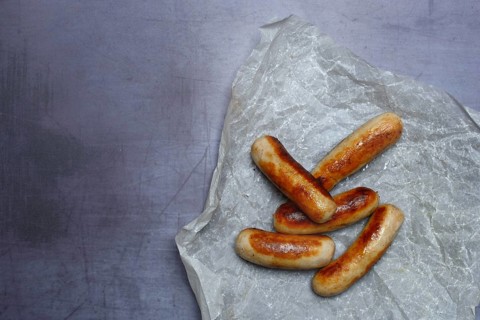 Several Chipolata sausages