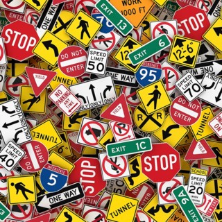 3D illustration of North American road signs like stop signs
