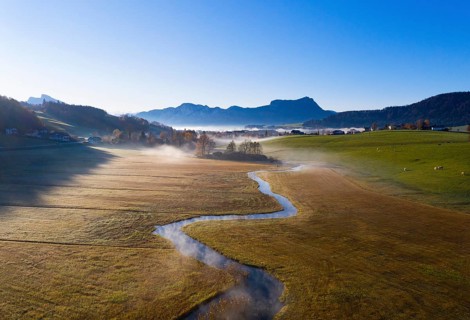 Outflow of the Zellerache from the Irrsee lake with view into the Mondseeland
