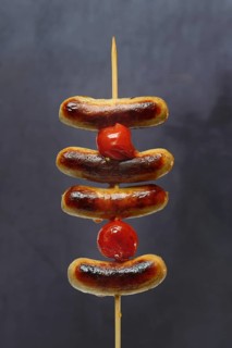 Chipolata sausages on wooden skewers Switzerland