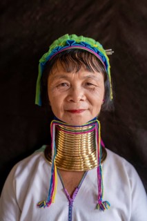 Long necked woman with several brass rings around her neck
