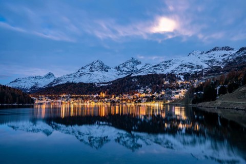 St. Moritz reflected in the St. Moritz lake at dusk