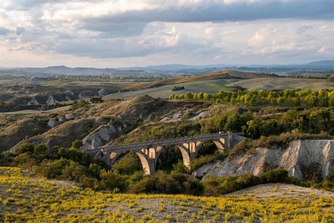 Railway bridge in the hilly landscape of the Crete Senesi
