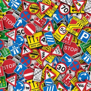 3D illustration of British road signs like stop signs
