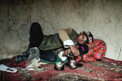 Man lying on a carpet