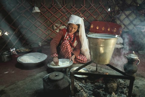 Woman stirring dough