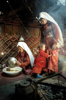 Two woman and a child in traditional Kyrgyz traditional traditional traditional traditional traditional traditional traditional traditional traditional costume