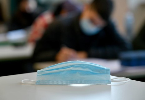Face mask on school desk