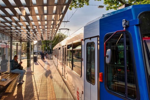 Tram of the Rheinbahn at the stop Nikolaus-Kopp-Platz in the district Heerdt