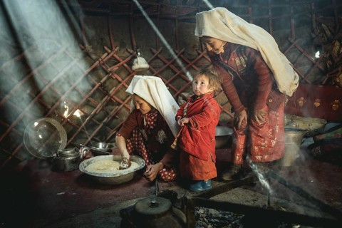 Two woman and a child in traditional Kyrgyz traditional traditional traditional traditional traditional traditional traditional traditional traditional costume