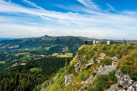 Walkers in the Sancy massif at back