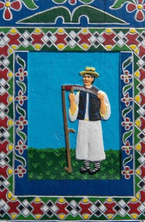 Portrait of a farmer on a grave cross in the Merry Cemetery