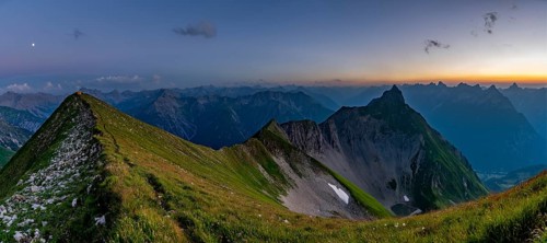 Summit ridge of Kreuzspitze with tent at the summit