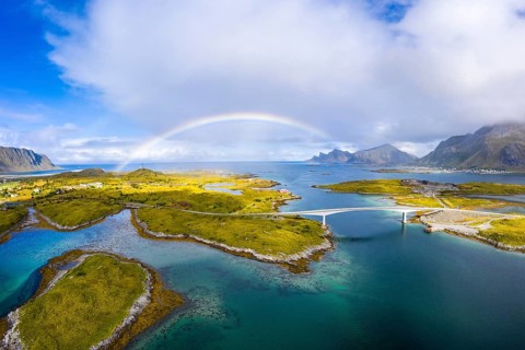 Rainbow over fjord