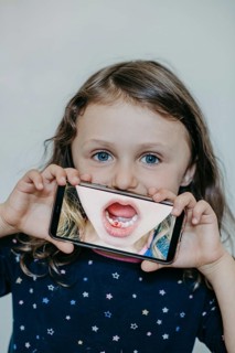 Girl with a tooth gap