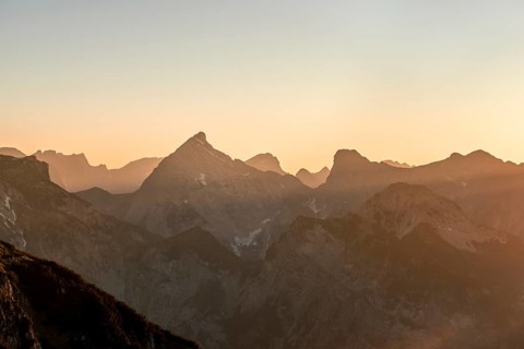 Sunset behind mountain silhouette