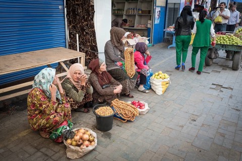 Saleswomen sitting on the floor