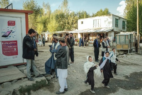 Three girls on a street in school uniform