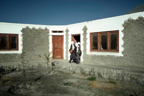 Girls enter school building