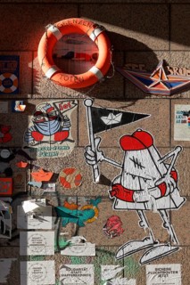 Lifebelt with writing Killing borders and paste-ups