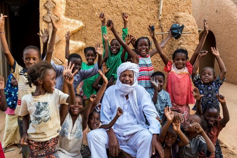Group of young children cheering