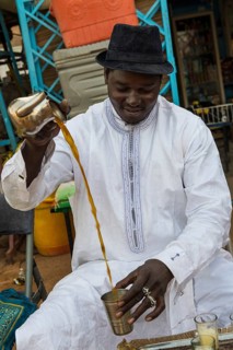 Local man pouring tea