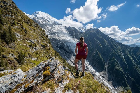 Hiker looking at mountain landscape