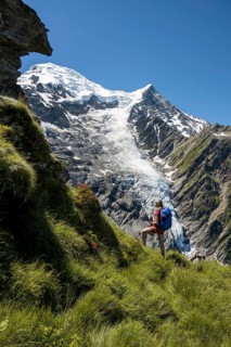 Hiker in front of glacier