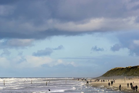 View over the north beach with waves and foam formation