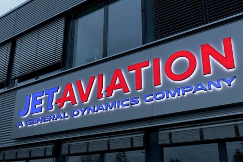 Illuminated logo of the company for services in the field of Airtaxi