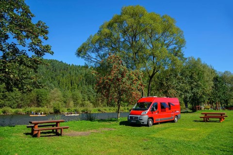 Motorhome on a campsite by the river Dunajez