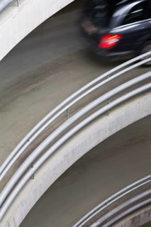 Car at the entrance of a parking garage