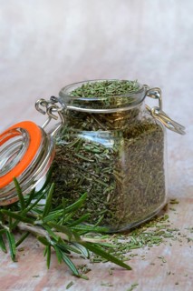 Dried rosemary in glass jar