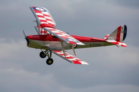 De Havilland DH.82 Tiger Moth aircraft in flight in Royal air force markings