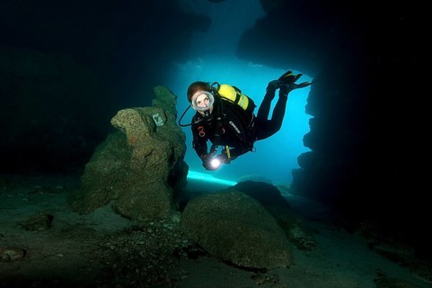 Diver in cave entrance